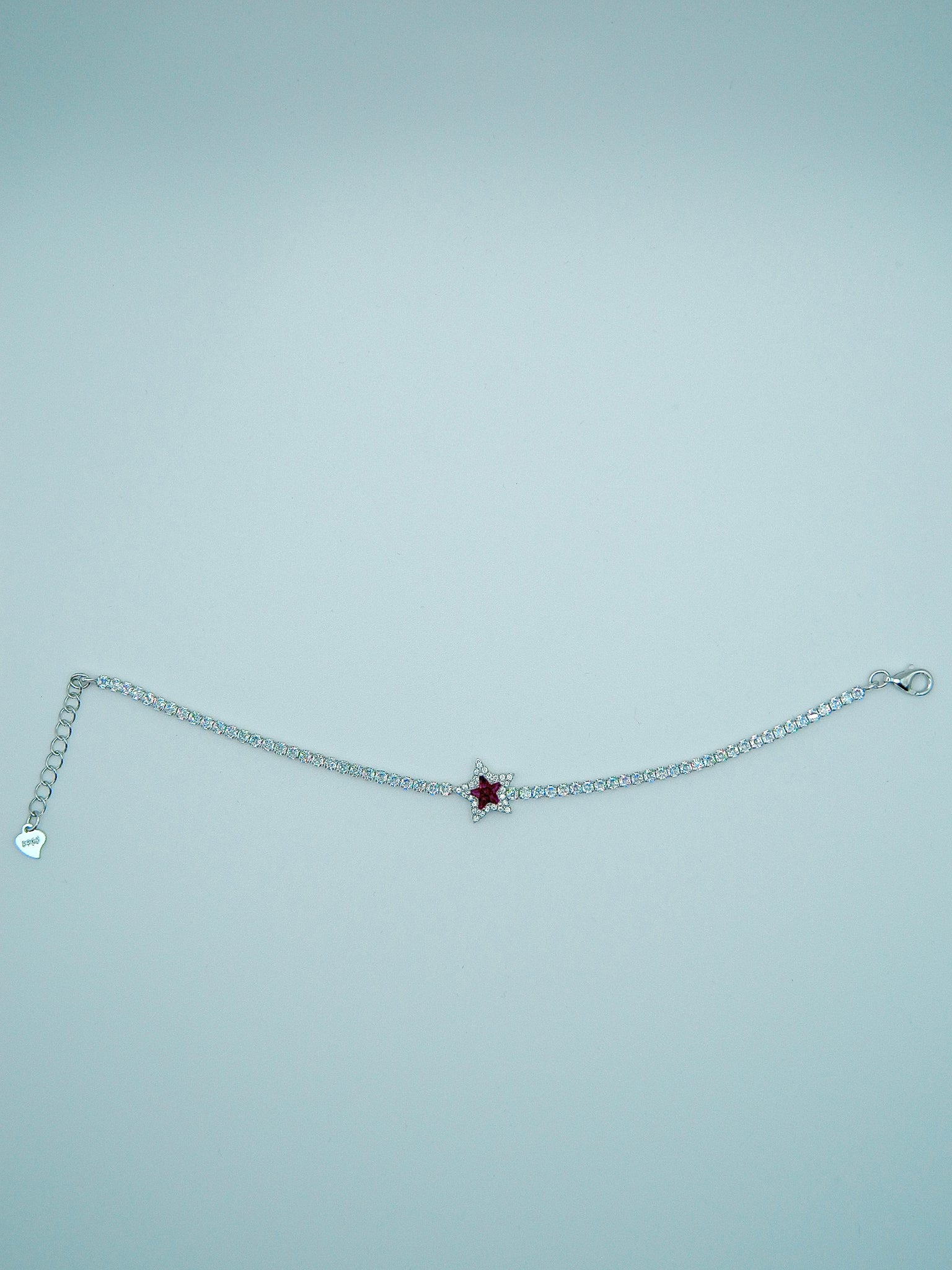 Radiant Star Bracelet with Ruby Red Gemstone