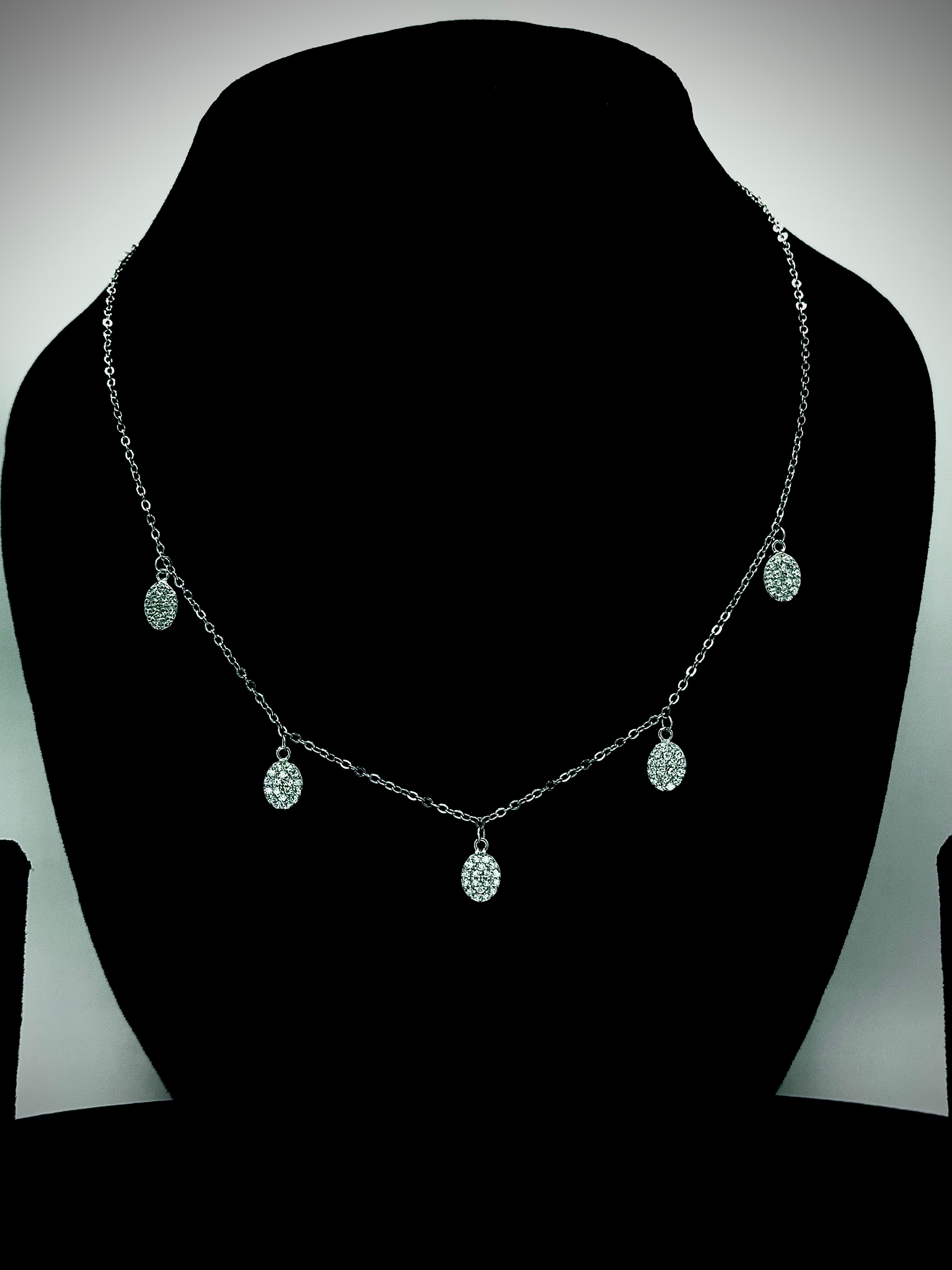 Elegant Sterling Silver Necklace with Delicate Oval Pendants